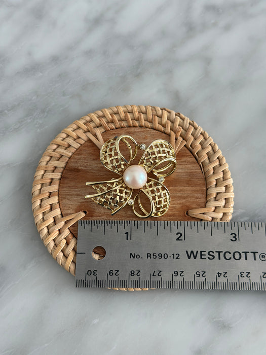 Gold Bow and Pearl Brooch